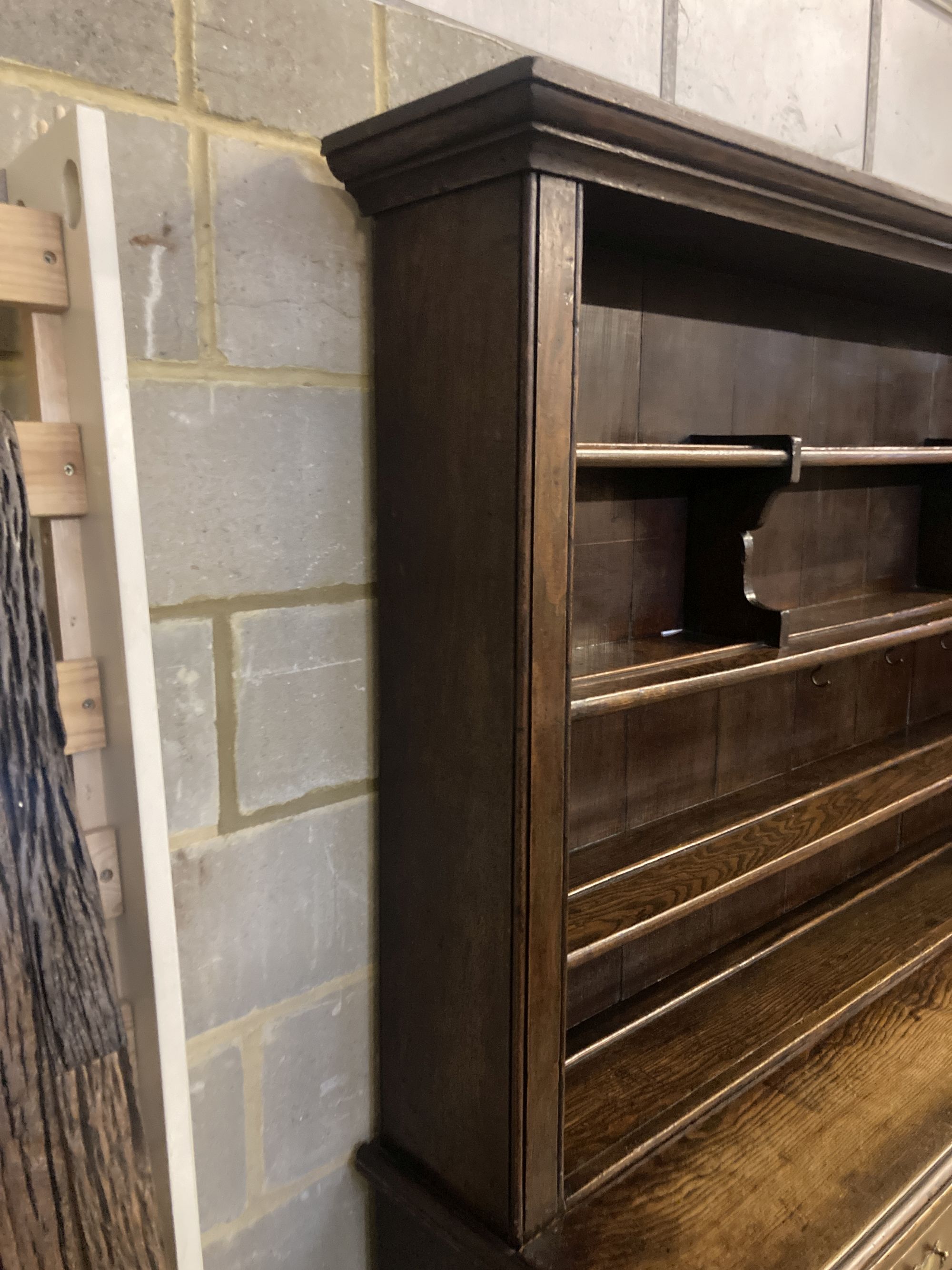 A George III oak and pine dresser, width 188cm depth 50cm height 204cm